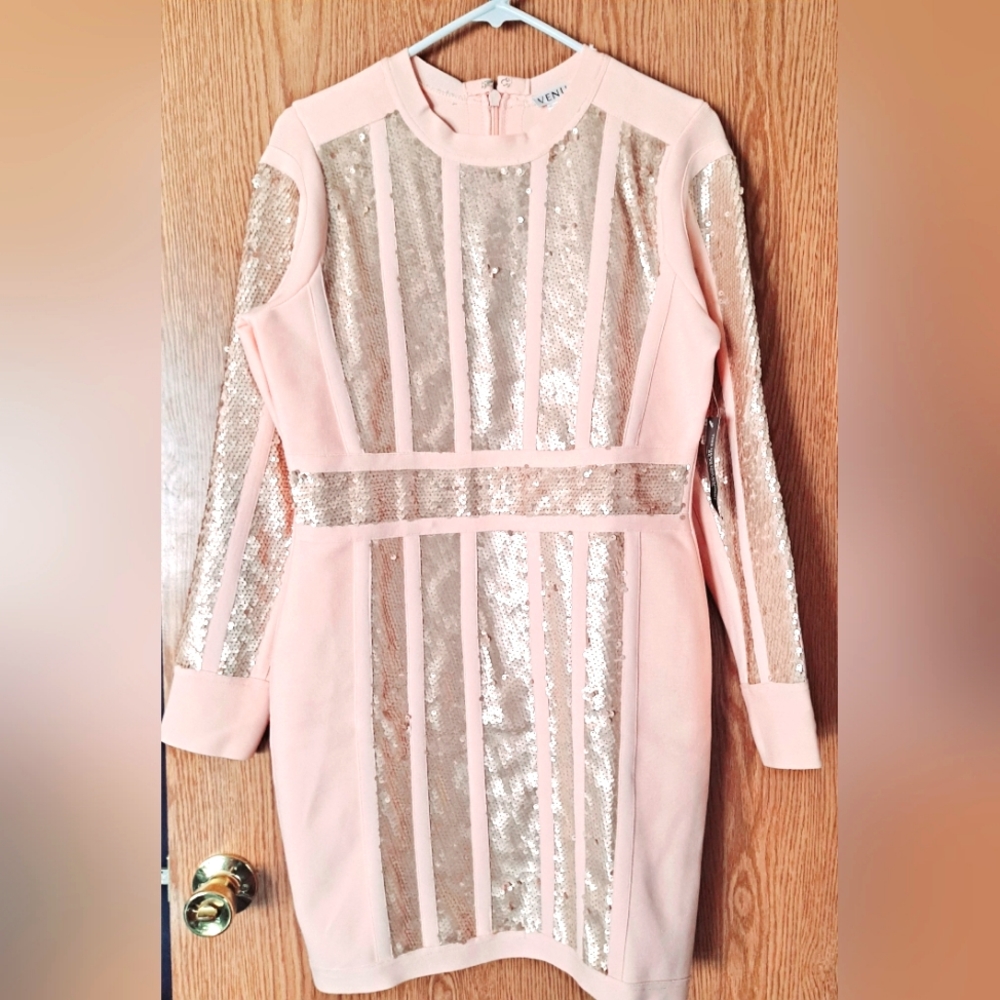 New Dress. Gorgeous sequins, size Large, made by and bought from Venus Fashions